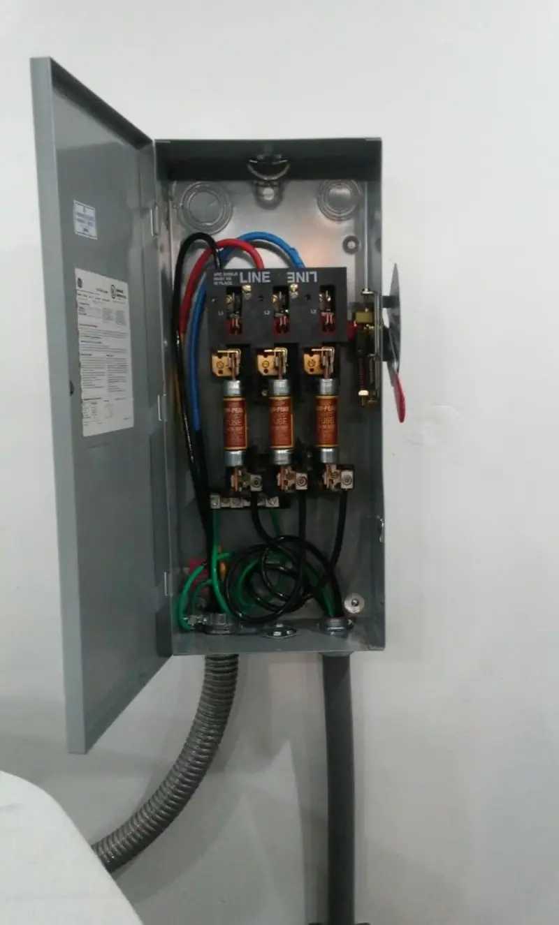 Three-phase disconnect switch installed for Smoke Detector Installation in Dunn